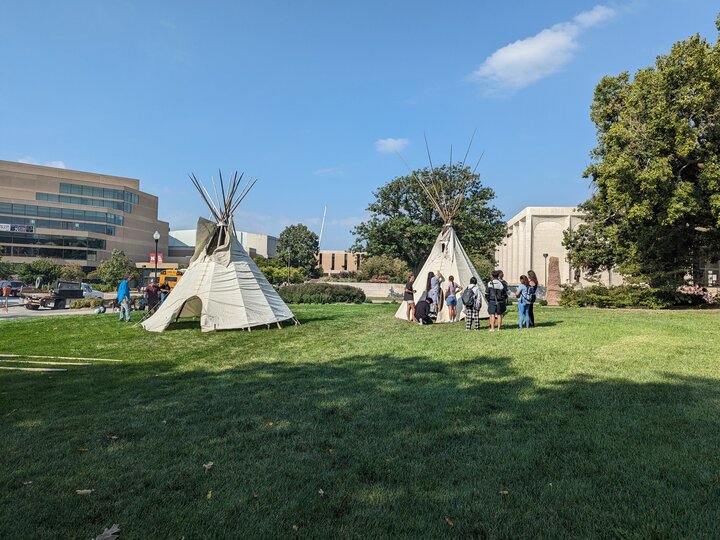 Tipis being raised for Otoe-Missouria Day