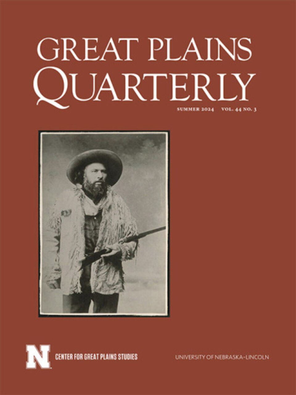 Great Plains Quarterly magazine cover with sepia-toned photo of a person holding a rifle.
